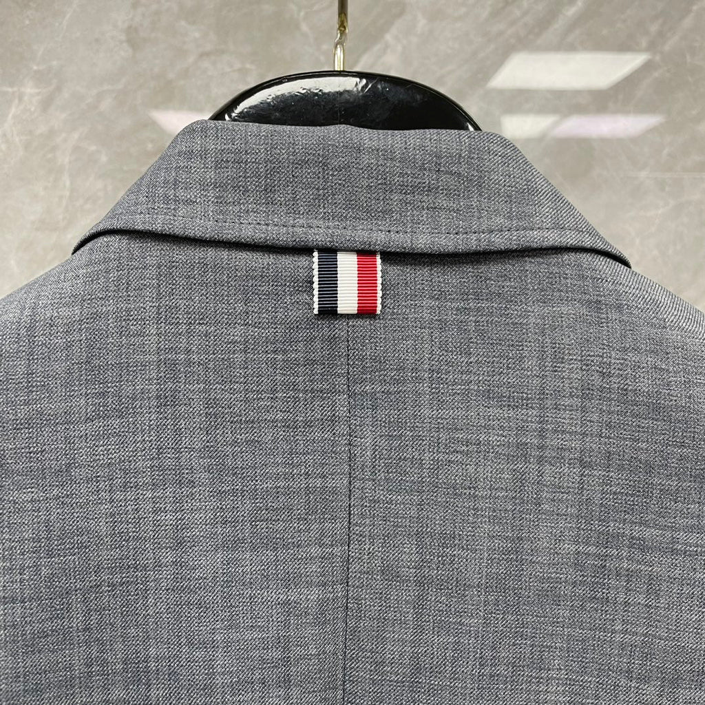 Men's 4 - Bar Suit Jacket with Signature Grosgrain Detail by Thom Browne, outerwear detail view