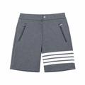 Gray knee-length shorts with four-bar stripe and zip pockets on a white square background