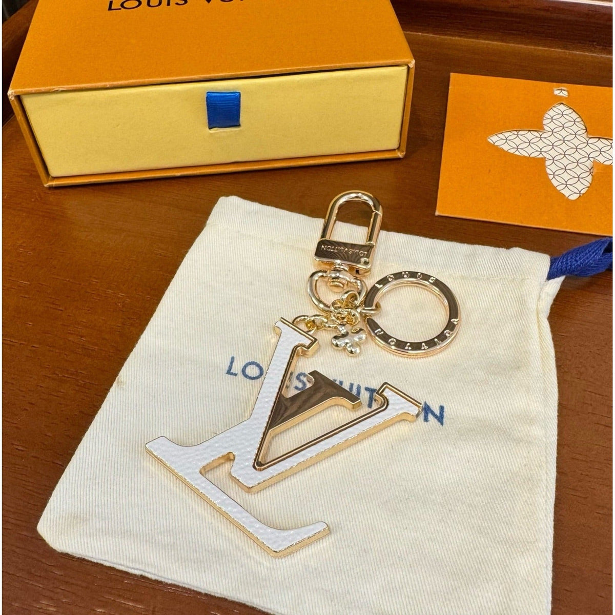 Louis Vuitton Brass Flower Bag Charm Keychain detail 2
