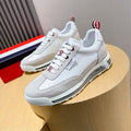 Thom Browne Men’s Grey White Performance Runner Sneakers – left-facing main product view