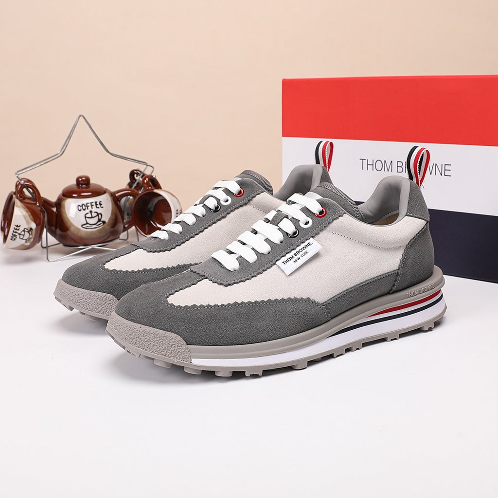 Thom Browne Men’s Grey Mixed-Material Retro Runner Sneakers – left-facing main product view
