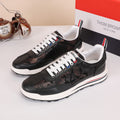 Thom Browne Men’s Black Monogram Leather Runner Sneakers – left-facing main product view