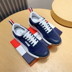 Thom Browne Men’s Navy White Gum-Sole Runner Sneakers – left-facing main product view