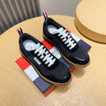 Thom Browne Men’s Black Gum-Sole Runner Sneakers – left-facing main product view