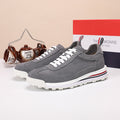 Thom Browne Men’s Charcoal Suede Retro Runner Sneakers – left-facing main product view