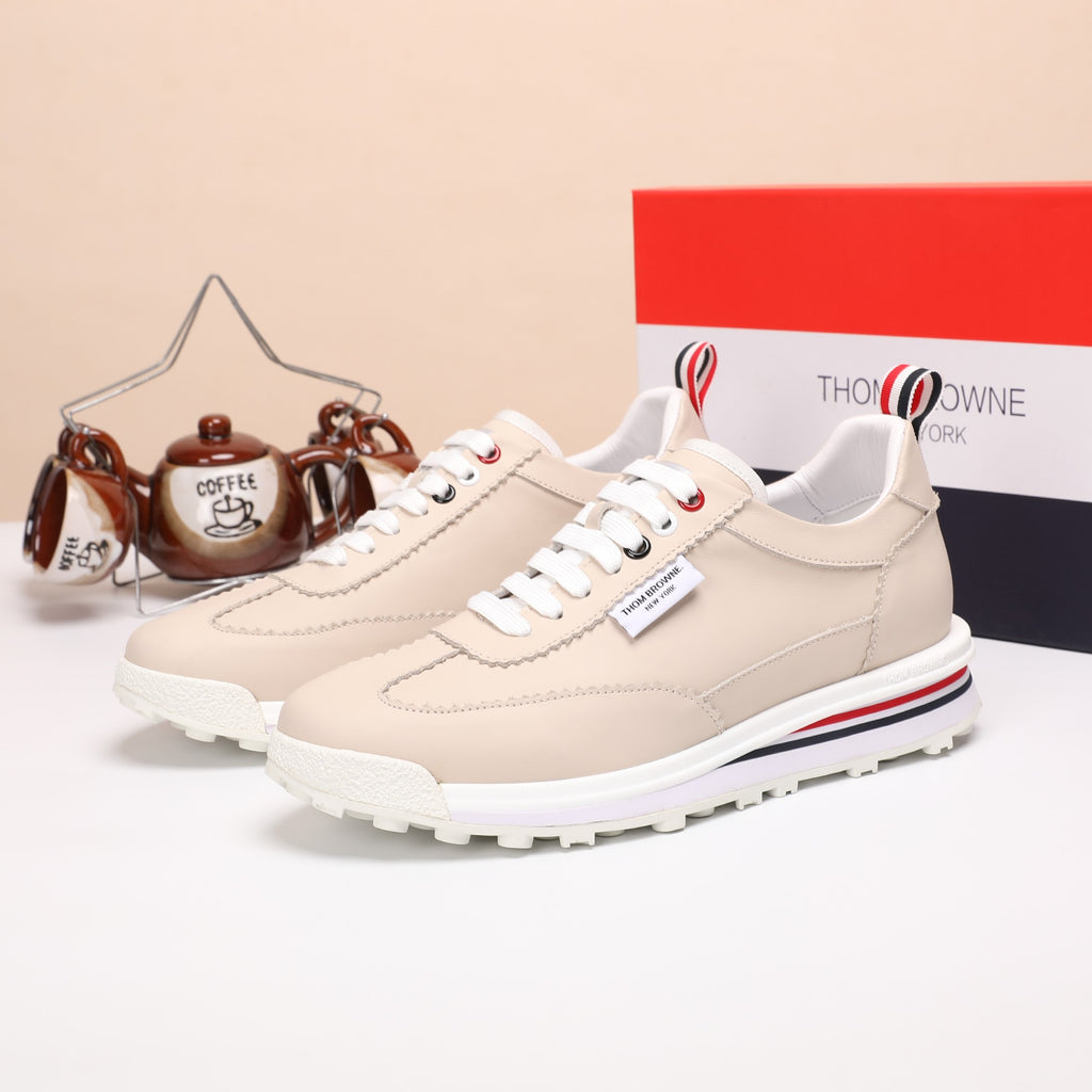 Thom Browne Men’s Beige Leather Runner Sneakers – left-facing main product view