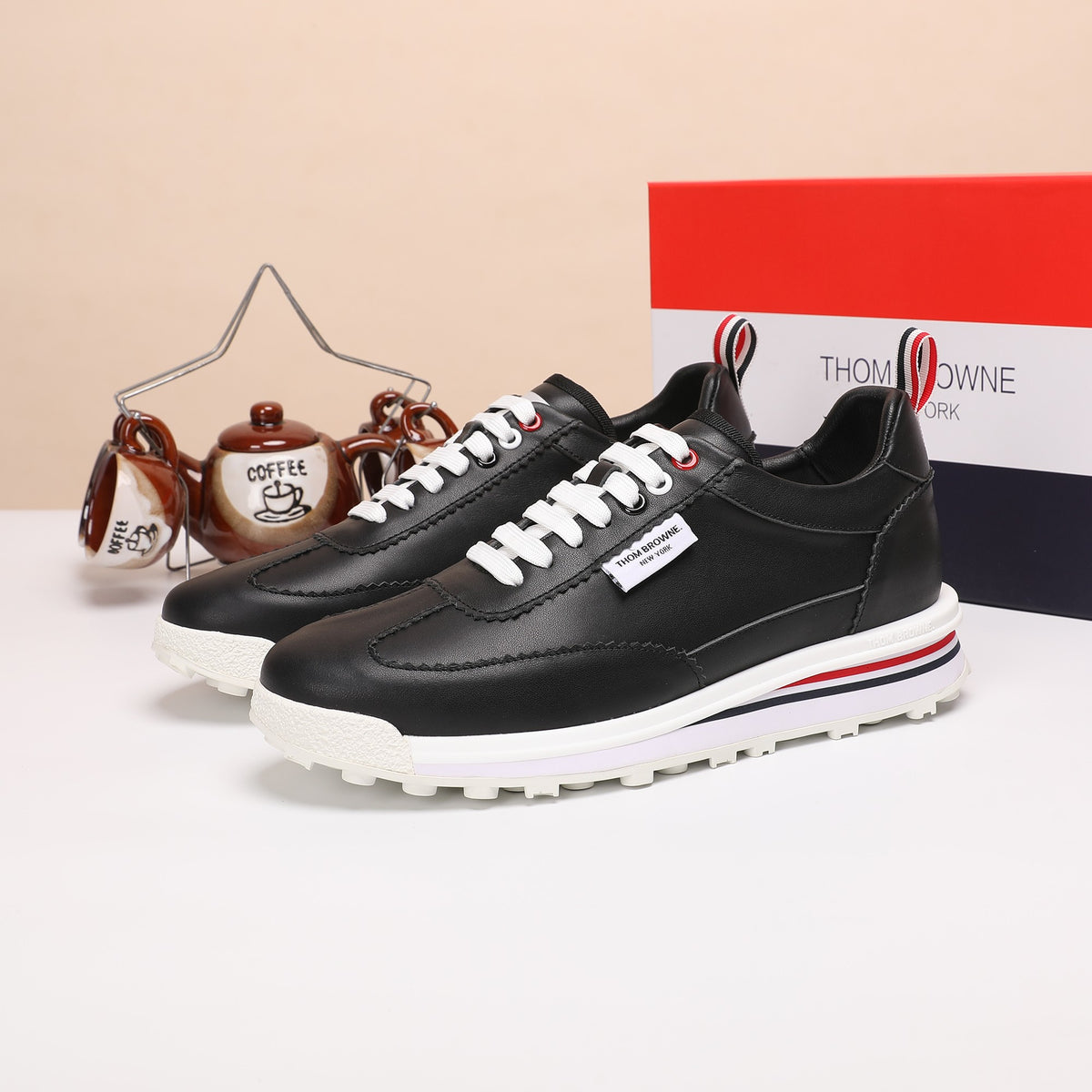 Thom Browne Men’s Black Leather Runner Sneakers – left-facing main product view