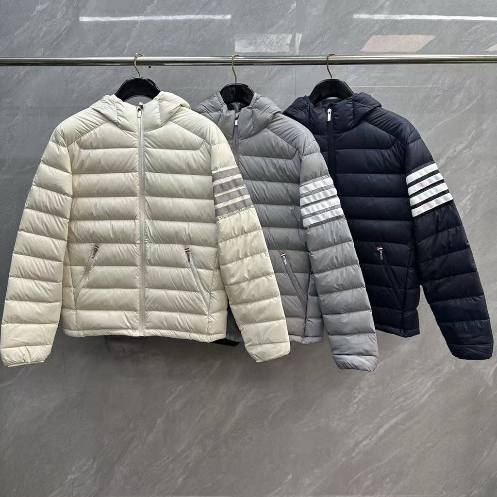 Thom Browne Panelled Four-Stripe Hooded Down Jacket detail view 1