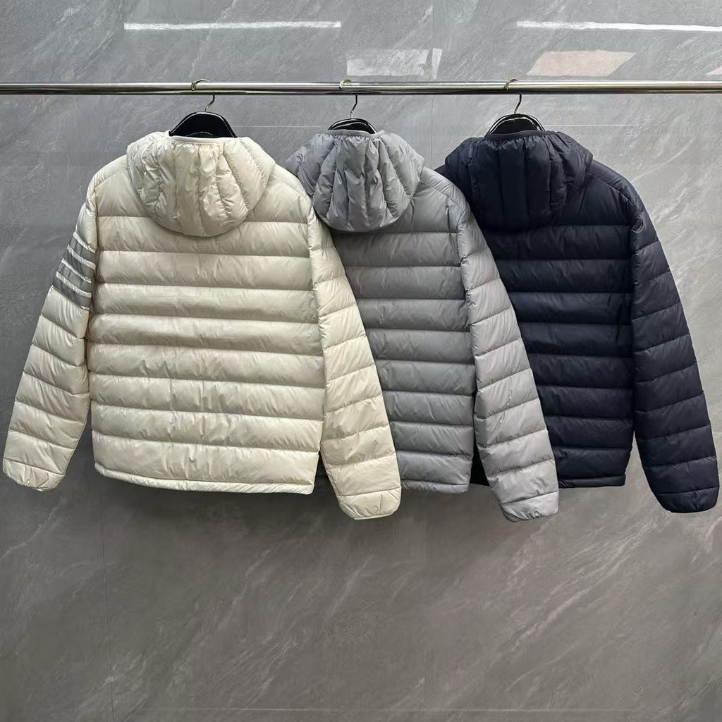 Thom Browne Panelled Four-Stripe Hooded Down Jacket detail view 2