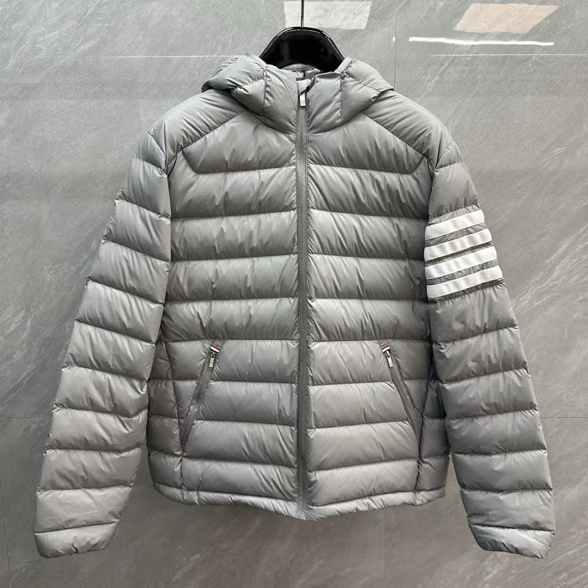 Thom Browne Panelled Four-Stripe Hooded Down Jacket detail view 4