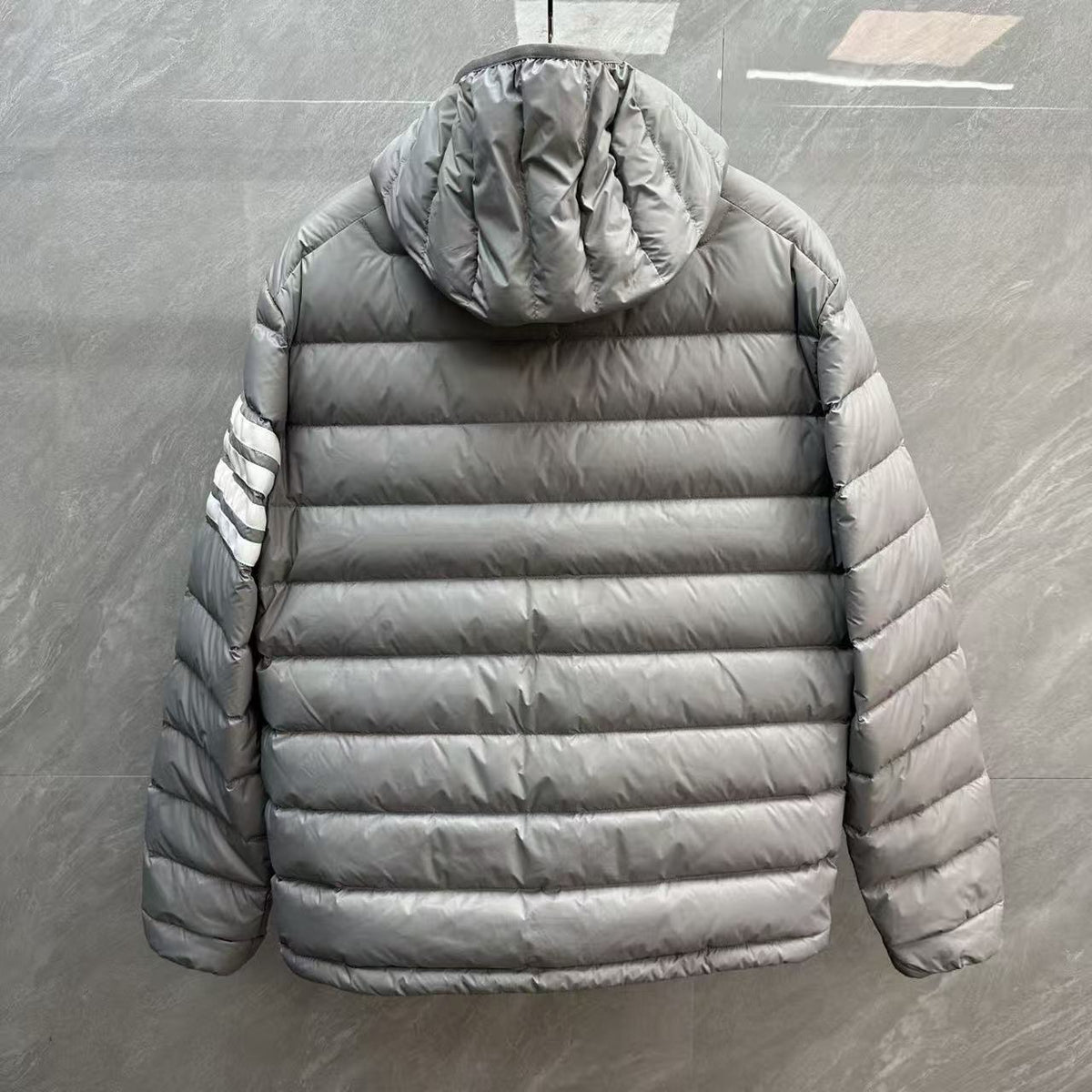 Thom Browne Panelled Four-Stripe Hooded Down Jacket detail view 5