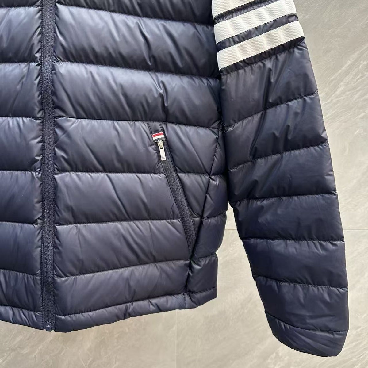 Thom Browne Panelled Four-Stripe Hooded Down Jacket detail view 9