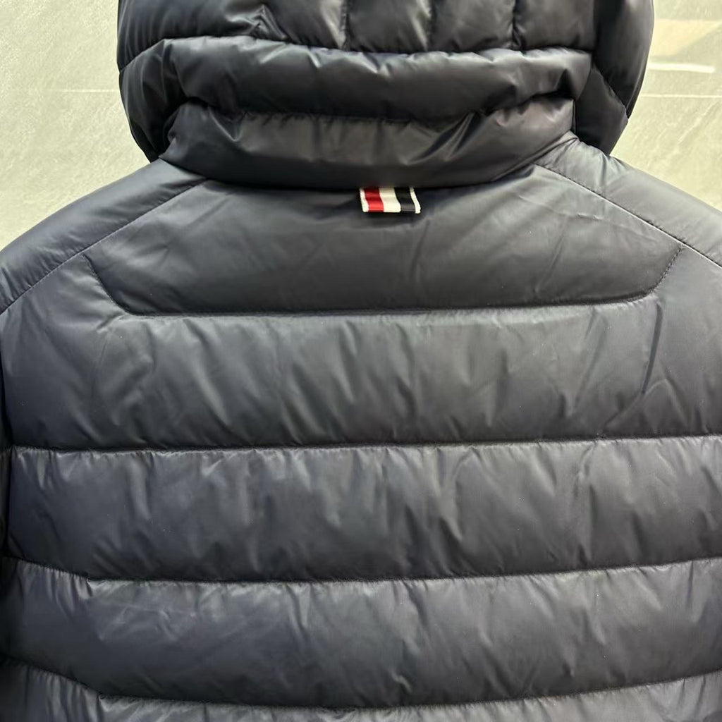 Thom Browne Panelled Four-Stripe Hooded Down Jacket detail view 11