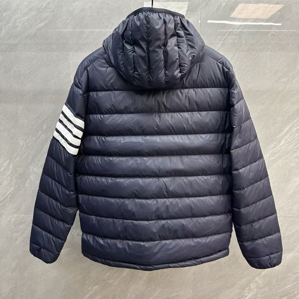 Thom Browne Panelled Four-Stripe Hooded Down Jacket detail view 12
