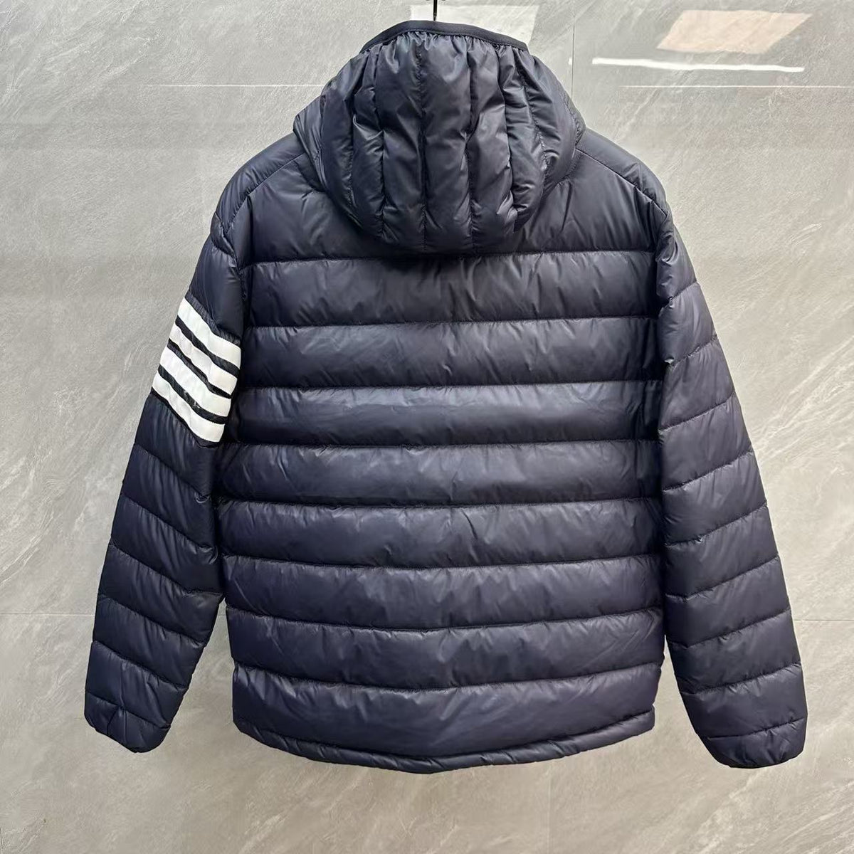 Thom Browne Panelled Four-Stripe Hooded Down Jacket detail view 12