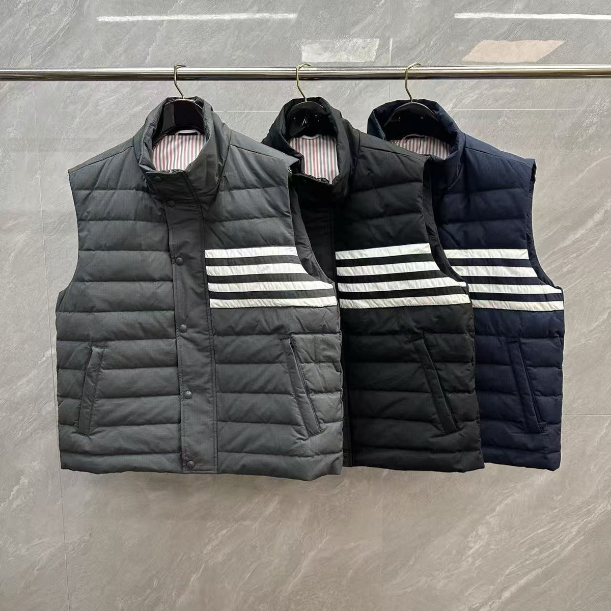 Thom Browne Four-Stripe Stand-Collar Down Vest detail view 1
