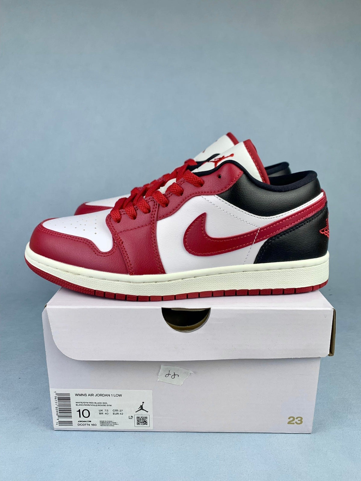 Air Jordan 1 Low Black, White, and Red Unisex Sneakers DC0774-160 detail view 2