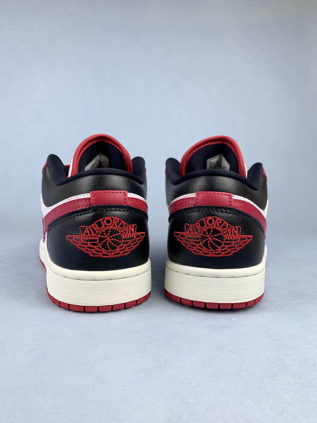 Air Jordan 1 Low Black, White, and Red Unisex Sneakers DC0774-160 detail view 5