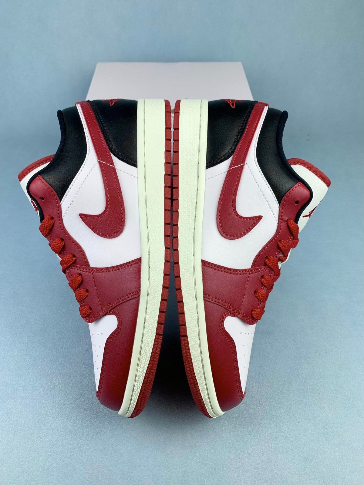 Air Jordan 1 Low Black, White, and Red Unisex Sneakers DC0774-160 detail view 3